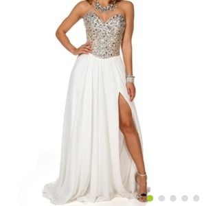 Formal strapless white dress with slit.