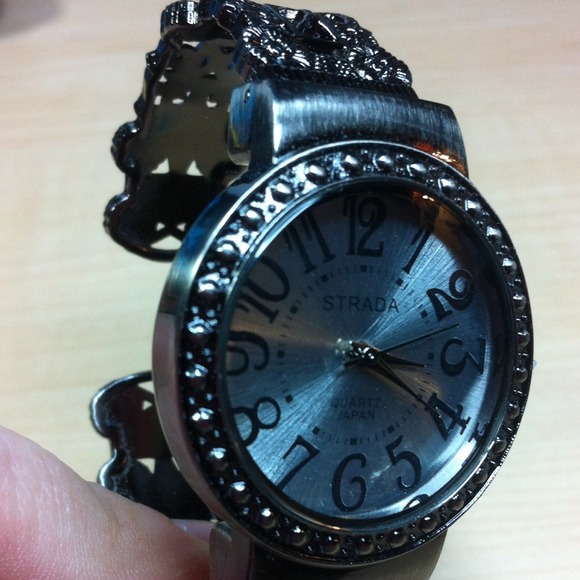 435. Brushed stainless steel cuff watches - Picture 2 of 4