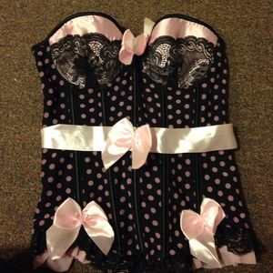 Pink and black polka dot corset