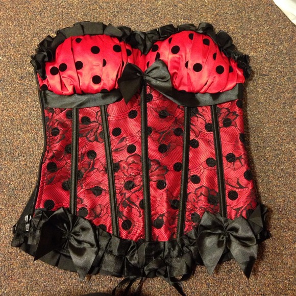 Red lacy corset with black dots