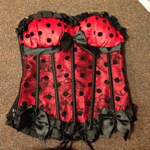 Red lacy corset with black dots