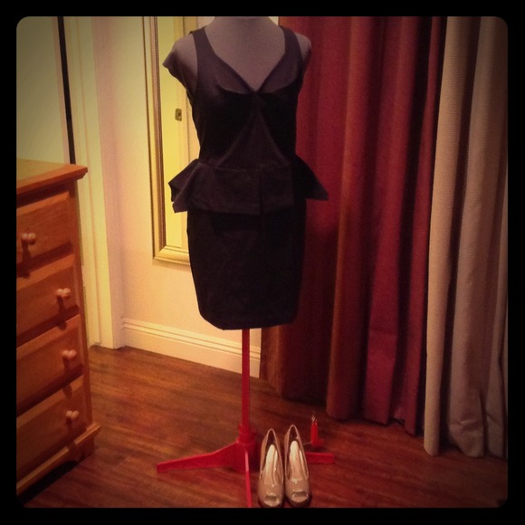 Gorgeous little black dress with peplum