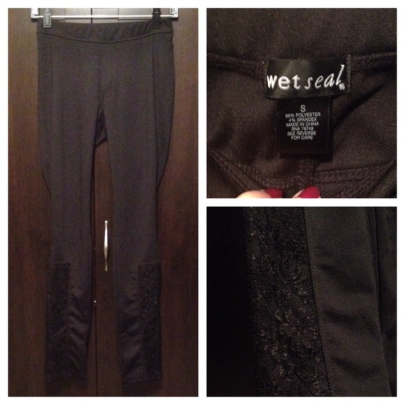 Black legging like pants with lace accent