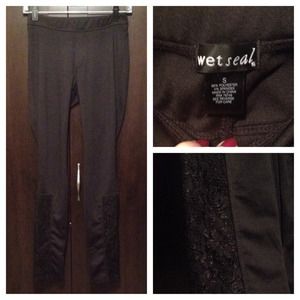 Black legging like pants with lace accent