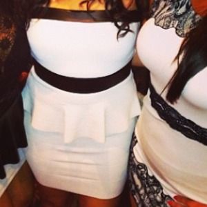 BEBE peplum strapless dress