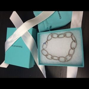 JUST WANT THIS GONE!! Tiffany twist link bracelet