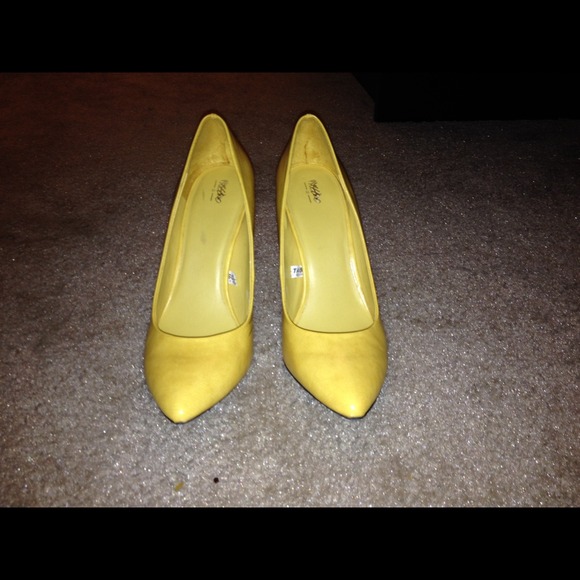 Yellow high heels