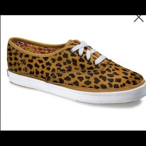 Cheetah van inspired sneakers .