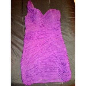 Purple one shoulder mini dress.