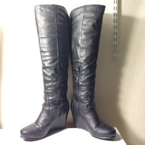 Over the knee wedge boots