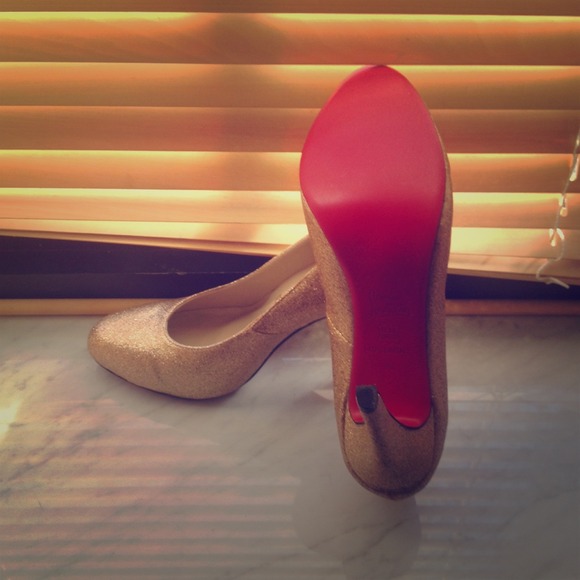 Never worn Christian Louboutin GOLD pumps!