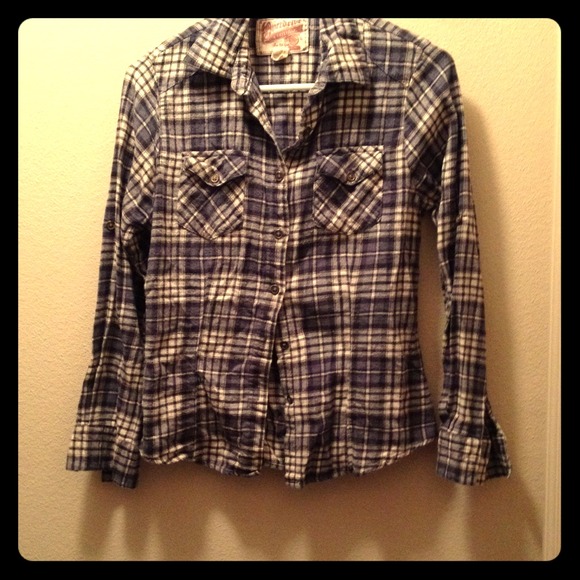 Super cute and warm button up plaid shirt