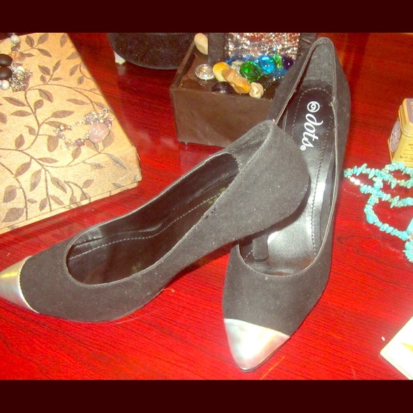 Classic black shoes with silver tip