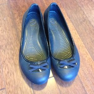 Very Comfy black crocs.