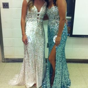 Pageant dress. Only worn once. The one on the left
