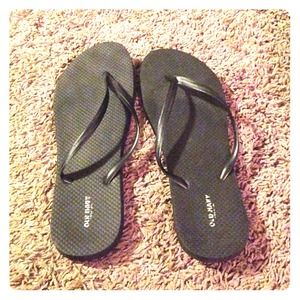Black Flip Flops.