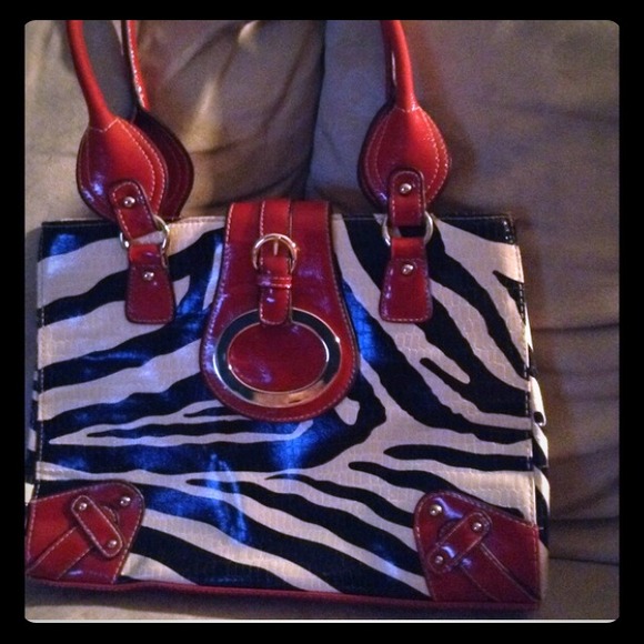 NWOT pretty zebra print with red detail purse
