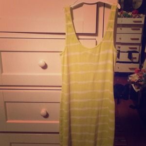 A form fitting, electric green beach bum dress