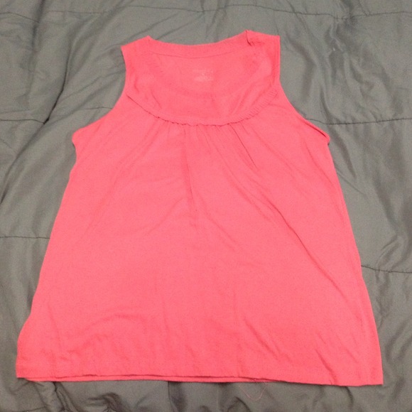 Pink tank with ruffled edges