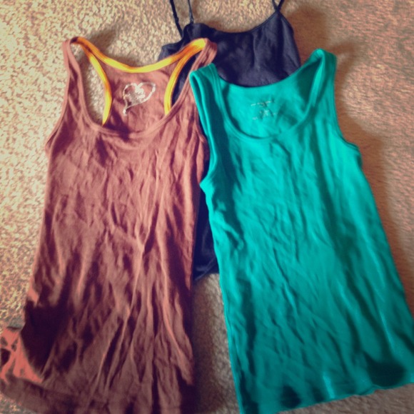 Tank tops: teal brown and black.