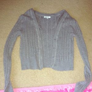 Delia's gray sweater