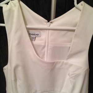 NWT white Bebe dress. Very classy and stylish.