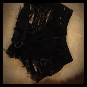 Distressed denim shorts.