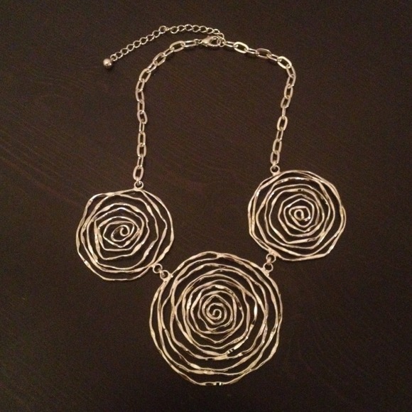 Silver metal spiral necklace.