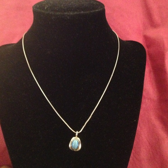Express Silvertone Necklace with blue pendant