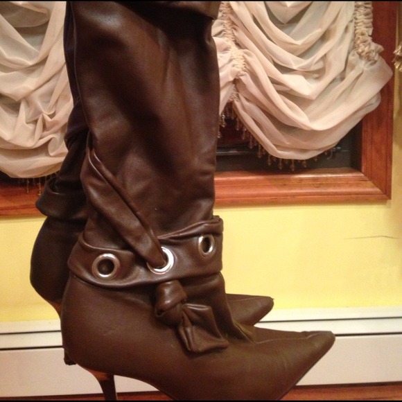 Light brown high heeled knee high boots
