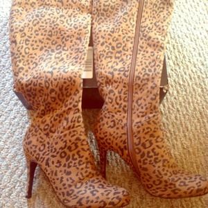 Brand new, never-worn, sz7, leopard print boots.