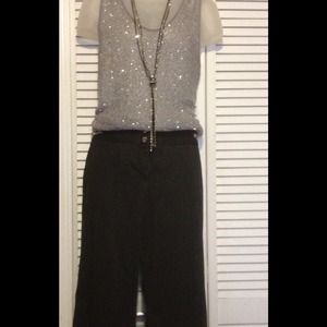 Michael Kors pinstriped slacks.