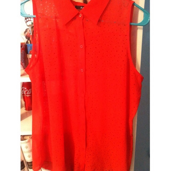 Red button up blouse.