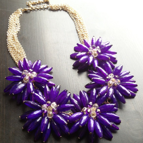 Purple and gold flower necklace.