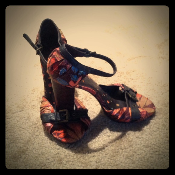 Dark brown with multi colored leaf detail shoes.