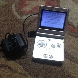 "Hold" till Friday Game boy advance SP silver