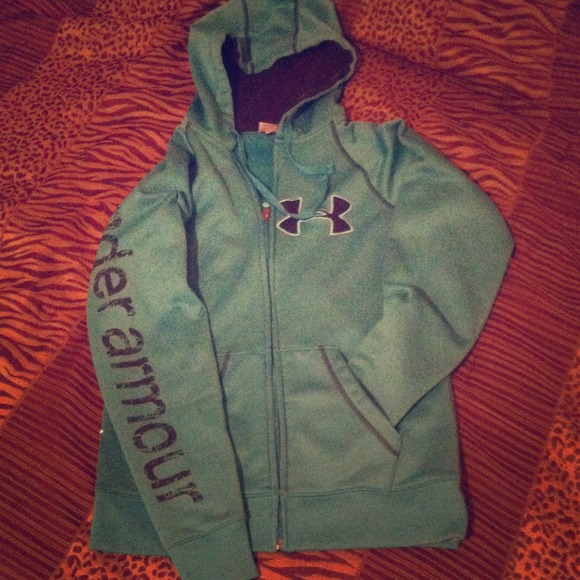 Teal colored under armour zip up hooded jacket