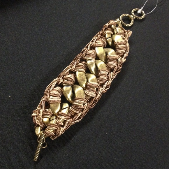 Gold and brown chunky bracelet.
