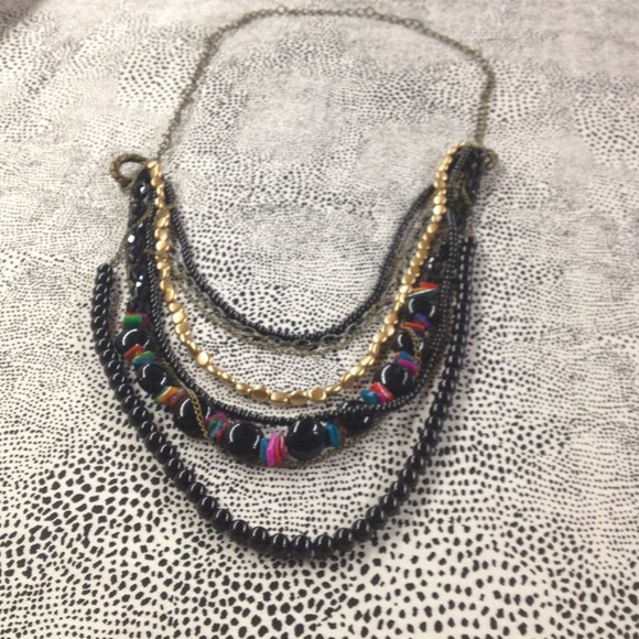 Funky black, gold and pink bead necklace