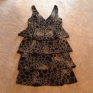 Flirty Fun in this Black and Gold  number.