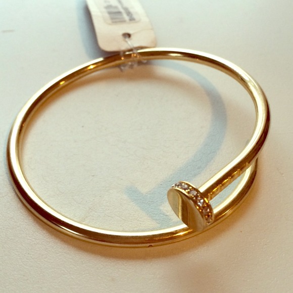 Gold-tone bracelet. Nail design. NWT