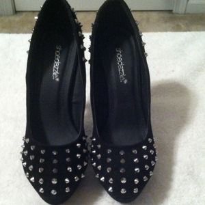 Black pumps with silver spikes