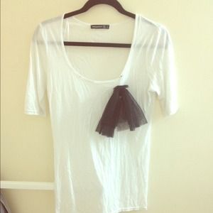 White shirt with black bow