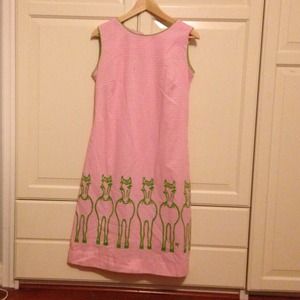 Pink gingham horse themed dress.