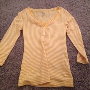 Yellow and white top.