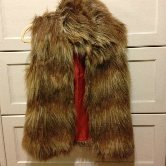 Tans&brown fur vest..size small