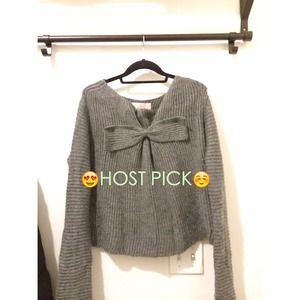 Pretty grey sweater with bow detail!