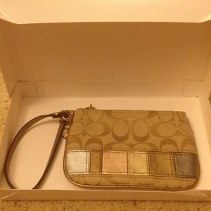 Coach gold wristlet