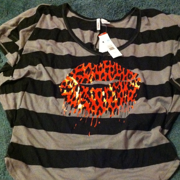 Gray and black stripped shirt with red lip detail!
