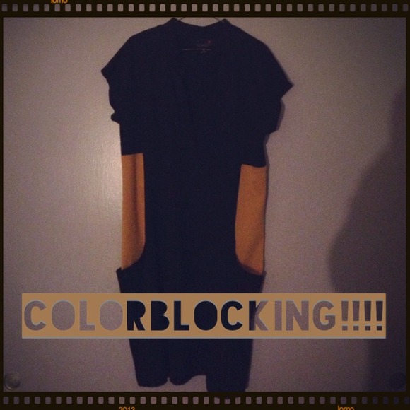 Black/mustard great fall piece! Flattering dress!